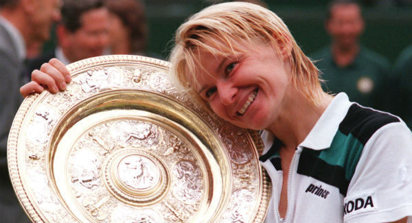 Jana Novotna with the gold plate after winning the Ladies Final match against Nathalie Tauziat at Wimbledon. Photo: Neil Munns/PA