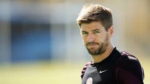 Gerrard admits he is still trying to adapt to Liverpool's academy system