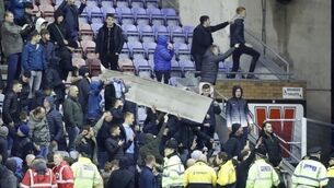 FA may probe pitch invasion and Sergio Aguero's altercation with Wigan fan