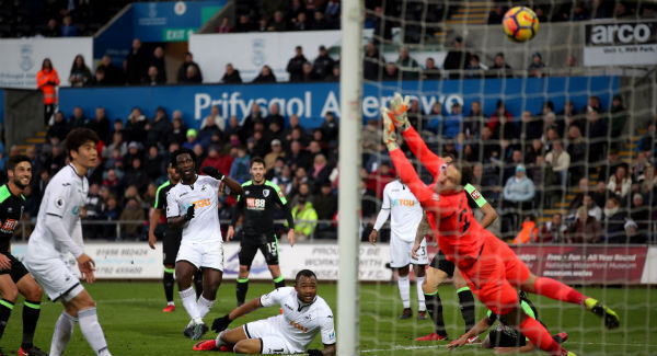 Swansea City's Wilfried Bony scores before having the goal disallowed at the Liberty Stadium. Photo: Nick Potts/PA