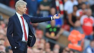 Arsene Wenger admits Arsenal tilt at title is 'unrealistic'