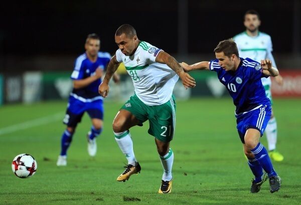 Northern Ireland's Josh Magennis (left) and San Marino's Andrea Grandoni battle for the ball.