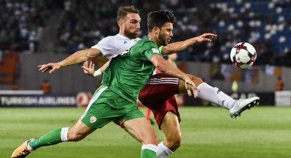 Shane Long in action against Guram Kashia at Boris Paichadze Dinamo Arena. Photo by David Maher/Sportsfile Shane Long in action against Guram Kashia at Boris Paichadze Dinamo Arena. Photo by David Maher/Sportsfile