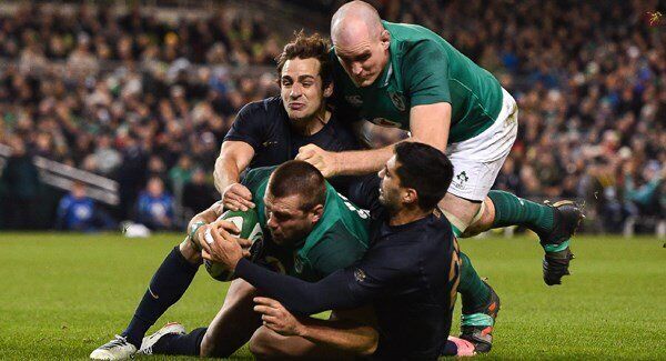 CJ Stander supported by Devin Toner to score Ireland's third try despite tackle of Nicolas Sanchez, left, and Jeronimo de la Fuente. Photo: Ramsey Cardy/Sportsfile