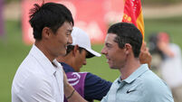 Rory McIlroy lets two-shot lead slip in Dubai as Li Haotong takes advantage