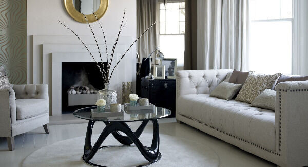 The DFS Trafalgar four-seater sofa comes in a choice of upholstery and colour options (€1,599), styled with the glass-topped Drift coffee table (€389). The DFS Trafalgar four-seater sofa comes in a choice of upholstery and colour options (€1,599), styled with the glass-topped Drift coffee table (€389).