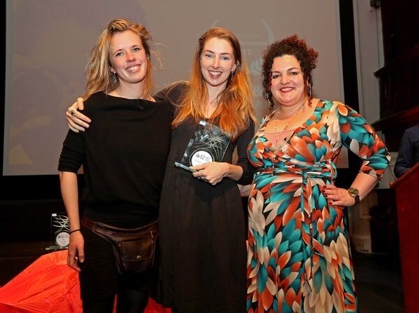 &lsquo;Mother &amp; Baby&rsquo; producer Alice McDowell and director Mia Mullarkey are presented with the award for Best Documentary Short by juror Farah Abushwesha at the Cork Film Festival awards night at Triskel Christchurch. Pictures: Jim Coughlan