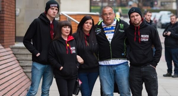 Members of paedophile-hunting group Predator Exposure, two of whom identified themselves as Christine (second left) and Phil (right), outside Leeds Crown Court today. Pic: PA Members of paedophile-hunting group Predator Exposure, two of whom identified themselves as Christine (second left) and Phil (right), outside Leeds Crown Court today. Pic: PA