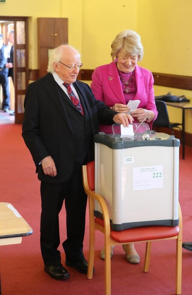 President Michael D Higgins and his wife Sabina cast their votes at the polling station in St Mary&rsquo;s Hospital, Phoenix Park, Dublin (Niall Carson/PA)