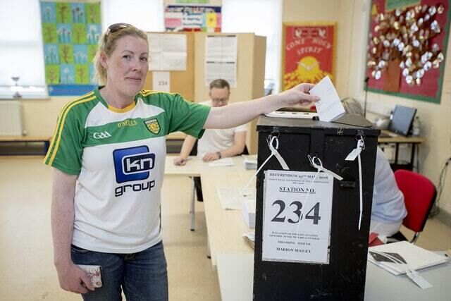 Marie O&rsquo;Donnell casts her vote at Scoil Mhuire Gan Smal Polling Station, Lifford, Co Donegal (Liam McBurney/PA)