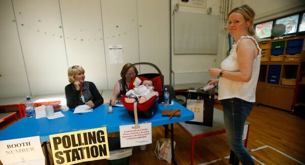 Nicola Faherty with Freya Molloy (4months) from Greystones casting vote at Delgany National School, Co Wicklow. Pic: Stephen Collins/Collins Photos