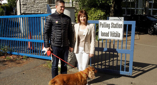 Minister for Arts Heritage and an Gaelteacht Josepha Madigan T.D. with her husband Finbarr Hayes and their dog Poppy