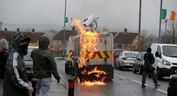 Youths attack Police vehicles as they try to prevent Members of Derry 1916 Easter Commemoration committee take part in an unregistered parade in the the Creggan area of Derry Northern Ireland. PRESS ASSOCIATION Photo.