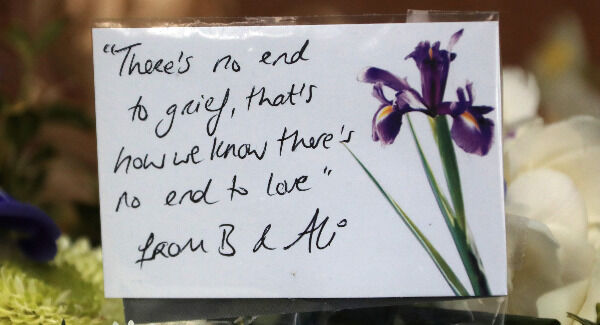 A message on flowers from U2's Bono and his wife Ali. Photo: Colin Keegan, Collins Dublin.