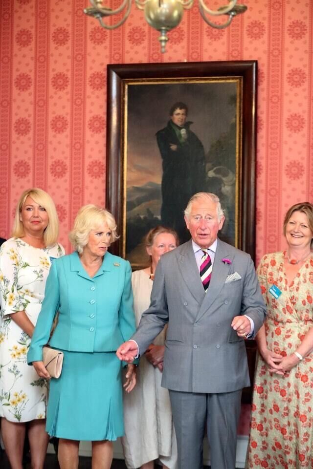 Camilla and Charles underneath a portrait of Daniel O’Connell (Niall Carson/PA) Camilla and Charles underneath a portrait of Daniel O’Connell (Niall Carson/PA)
