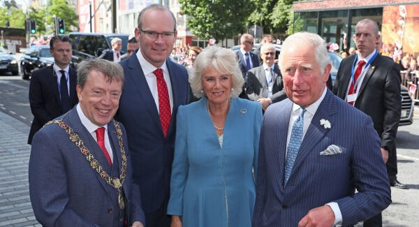 The Prince of Wales (right) and the Duchess of Cornwall (centre right) meet Minister for Foreign Affairs Simon Coveney (2nd left) and Lord Mayor of Cork Tony Fitzgerald. Picture: Brian Lawless/PA Wire