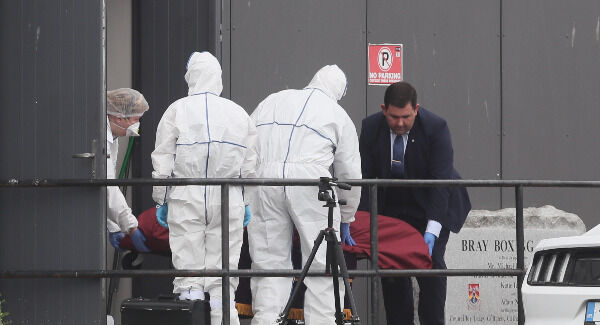 The body of Bobby Messett is removed from Bray Boxing Club, where three people were shot yesterday morning. Picture: PA The body of Bobby Messett is removed from Bray Boxing Club, where three people were shot yesterday morning. Picture: PA