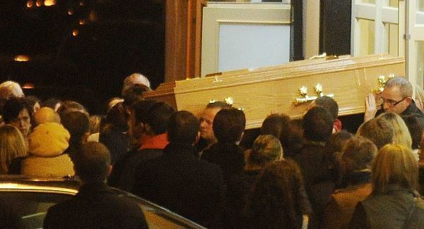 Olivia's coffin is removed