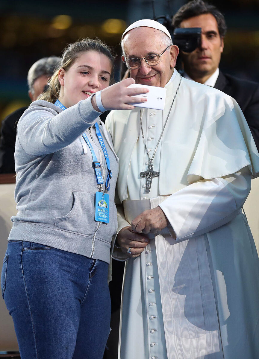 Pope Francis takes a “selfie’ with Alison Nevin age 12 from the Carrickmines tragedy family at Croke Park