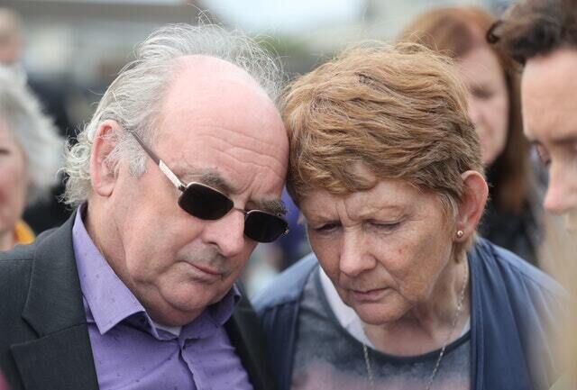 Catherine Corless and husband Aiden  (Niall Carson/PA)