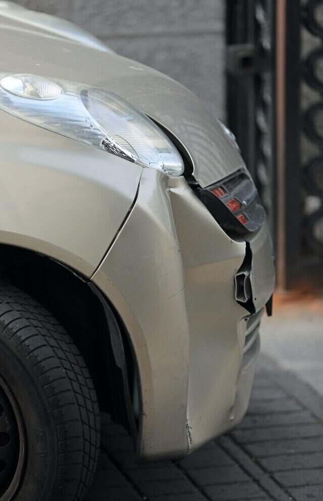 Damage to the front of the Nissan Micra after the crash (Niall Carson/PA)