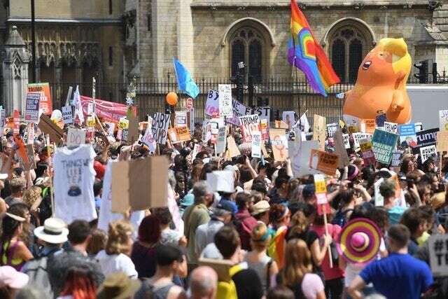 Protesters on Parliament Green in London (Victoria Jones/PA)