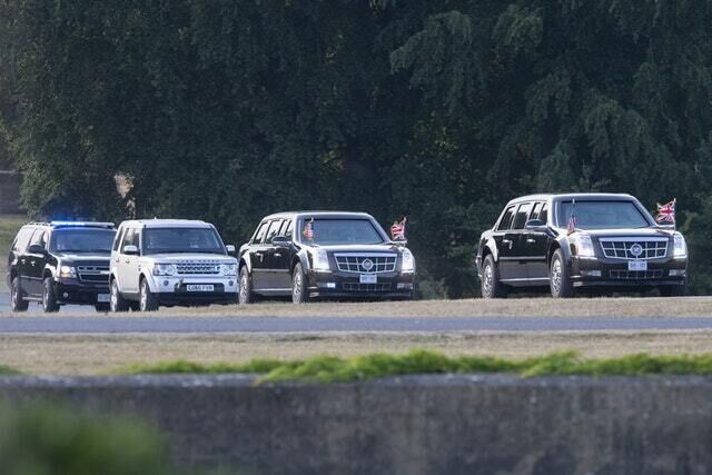 The US presidential cars arrive at Blenheim Palace in Oxfordshire (Will Oliver/PA)