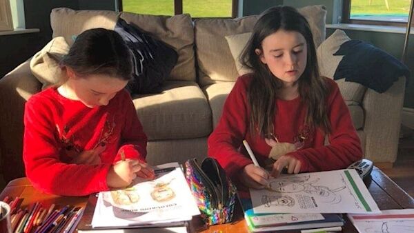 Charlotte and Madeline Payne from Mayo colouring some of their favourite Mayo stars. These two are always at matches with their parents.