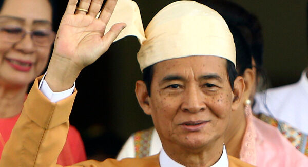 Myanmar's new President Win Myint waves to the media after taking oaths at Parliament in Naypyitaw, Myanmar. Pic: AP Photo/Aung Shine Oo Myanmar's new President Win Myint waves to the media after taking oaths at Parliament in Naypyitaw, Myanmar. Pic: AP Photo/Aung Shine Oo