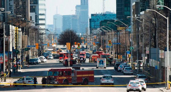 Emergency services close Yonge Street in Toronto. Photo: Nathan Denette/The Canadian Press via AP