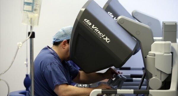 Surgeons using the da Vinci Xi surgical system carry out a colorectal surgery at the Royal Marsden in London. A cancer patient is recovering at home after being operated on in two areas at the same time in a rare procedure using the robot. PRESS ASSOCIATION Photo. Surgeons using the da Vinci Xi surgical system carry out a colorectal surgery at the Royal Marsden in London. A cancer patient is recovering at home after being operated on in two areas at the same time in a rare procedure using the robot. PRESS ASSOCIATION Photo.
