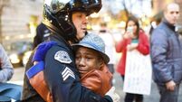 Family of eight, whose son was famed for this protest photo, die when car goes off cliff