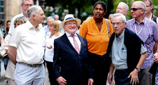 President Higgins with Dr Eusebio Leal a historian of the old city of Havana and David Stanton, Minister of state at dept of Justice and equality as he takes a walking tour while In the old city of Havana Pic: Maxwells