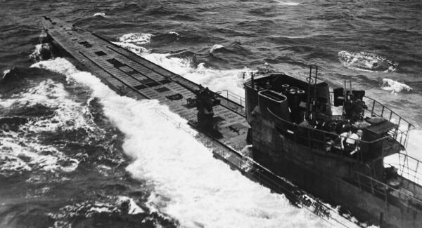 A surfaced German U-boat is under attack by American B-25 Mitchell and B-24 Liberator bombers in the north Atlantic. A few minutes after this photo was taken, the vessel had been sunk. A surfaced German U-boat is under attack by American B-25 Mitchell and B-24 Liberator bombers in the north Atlantic. A few minutes after this photo was taken, the vessel had been sunk.