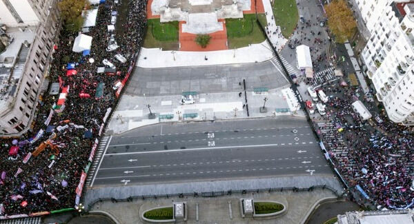 Argentina’s pro-abortion demonstrations outside Congress, left, have been far larger than pro-life protests, right. AP Photo/Jorge Saenz