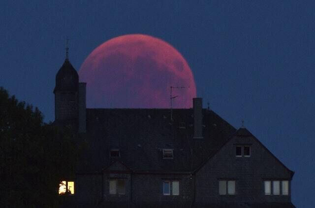 The moon turns red in Bernkastel-Kues, Germany (Harald Tittel/AP)