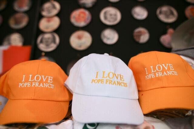 &lsquo;I Love Pope Francis&rsquo; hats on sale in Dublin (Aaron Chown/PA)