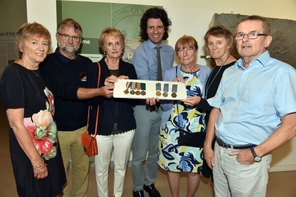 Dan Breen (centre), acting curator of Cork Public Museum, accepts the donation of Patsy Sliney’s First World War and RNLI medals from his grandchildren, left to right, Evelyn Conway, Colm Sliney, Margaret O’Driscoll, Agnes Dunlea, Bernadette Higgins, and Brendan Sliney. Picture: Eddie O’Hare. Dan Breen (centre), acting curator of Cork Public Museum, accepts the donation of Patsy Sliney’s First World War and RNLI medals from his grandchildren, left to right, Evelyn Conway, Colm Sliney, Margaret O’Driscoll, Agnes Dunlea, Bernadette Higgins, and Brendan Sliney. Picture: Eddie O’Hare.