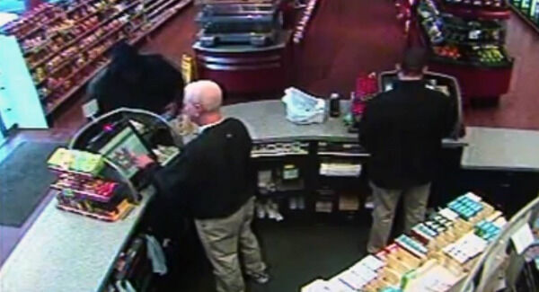 He is caught on a store surveillance camera in Iowa buying one of the winning tickets. He is caught on a store surveillance camera in Iowa buying one of the winning tickets.