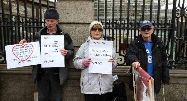 People pray for the unborn and for a No vote in the EighthReferendum outside Leinster House earlier this month. Photo: Sam Boal/RollingNews.ie.