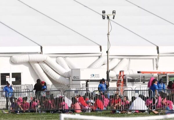 Immigrant children are shown outside a former Job Corps site that now houses them on June 18, 2018, in Homestead, Fla. (AP Photo/Wilfredo Lee) Immigrant children are shown outside a former Job Corps site that now houses them on June 18, 2018, in Homestead, Fla. (AP Photo/Wilfredo Lee)