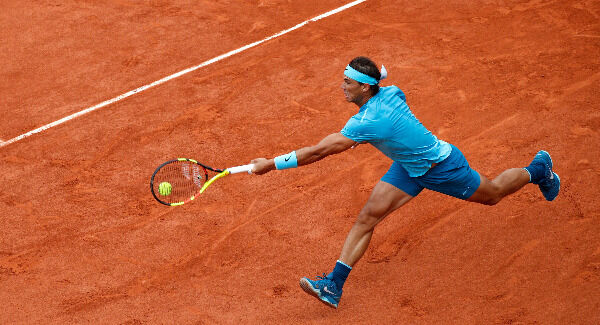 Spain's Rafael Nadal returns the ball to Austria's Dominic Thiem during the men's final match of the French Open. Photo: AP Photo/Christophe Ena