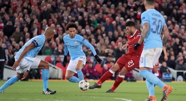 Alex Oxlade-Chamberlain scores his side's second goal. Pic: PA