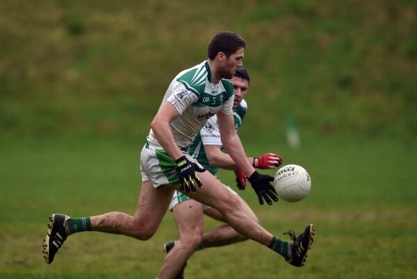 Ilen Rovers Conor O'Driscoll goes past Ballincollig's JP Murphy during the Cork SFC at Macroom yesterday. Picture: Eddie O'Hare