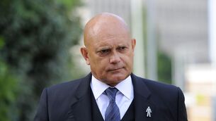 Family and friends have remembered Ray Wilkins at emotional memorial service