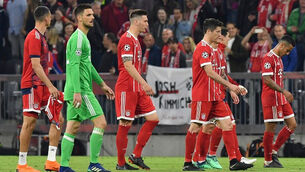 Bayern Munich charged by UEFA for pitch invasion and offensive banner
