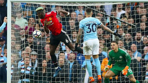 Pogba leads United comeback as stunning win puts City's title celebrations on hold