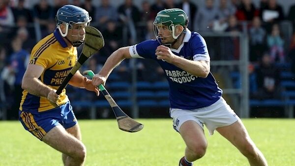 Cratloe's Cathal McInerney and Noel Purcell of Sixmilebridge Mandatory Credit ©INPHO/Lorraine O’Sullivan