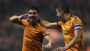 Wolves move to brink of Premier League with win over Derby
