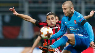 Ozil orchestrates Arsenal's victory over AC Milan